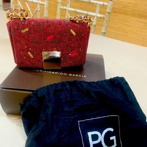 Purificación García cross body purse